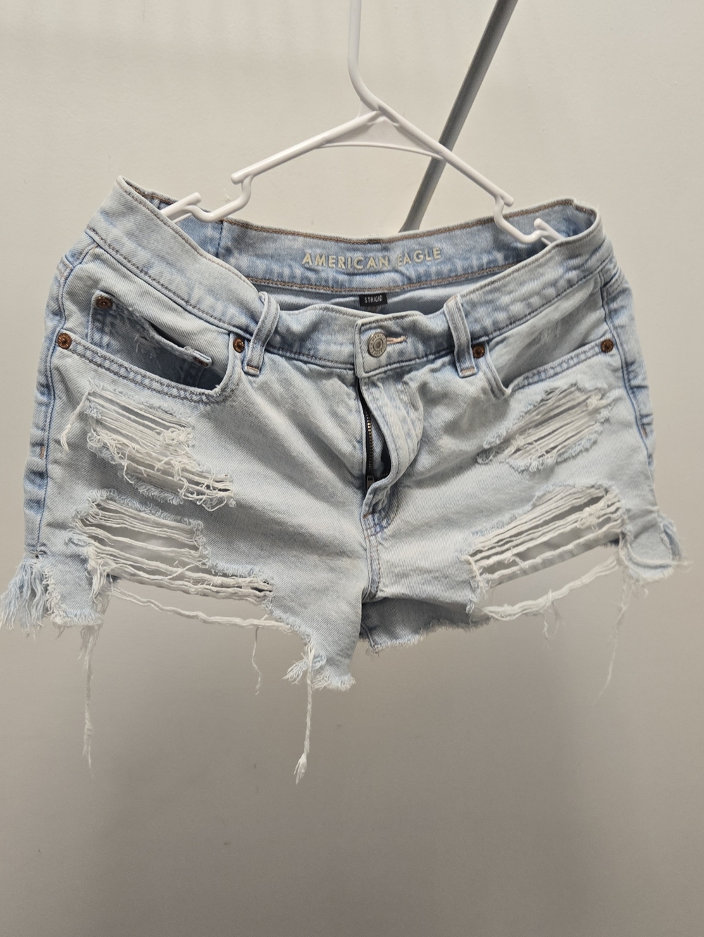 American Eagle Outfitters Light Blue Distressed Denim Shortalls